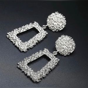$20 each Textured Silver Drop Earrings
2" drop
